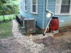Rain barrel and drainage trench to mitigate heavy stormwater flow